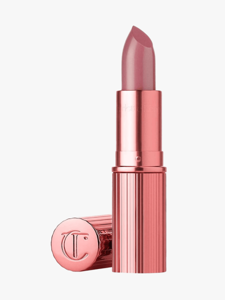Charlotte Tilbury K.I.S.S.I.N.G Lipstick in branded component on a light gray background
